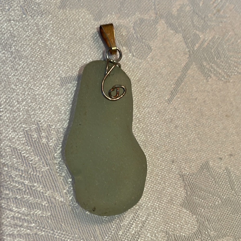 Handcrafted pendant in sea glass with blue/green hue